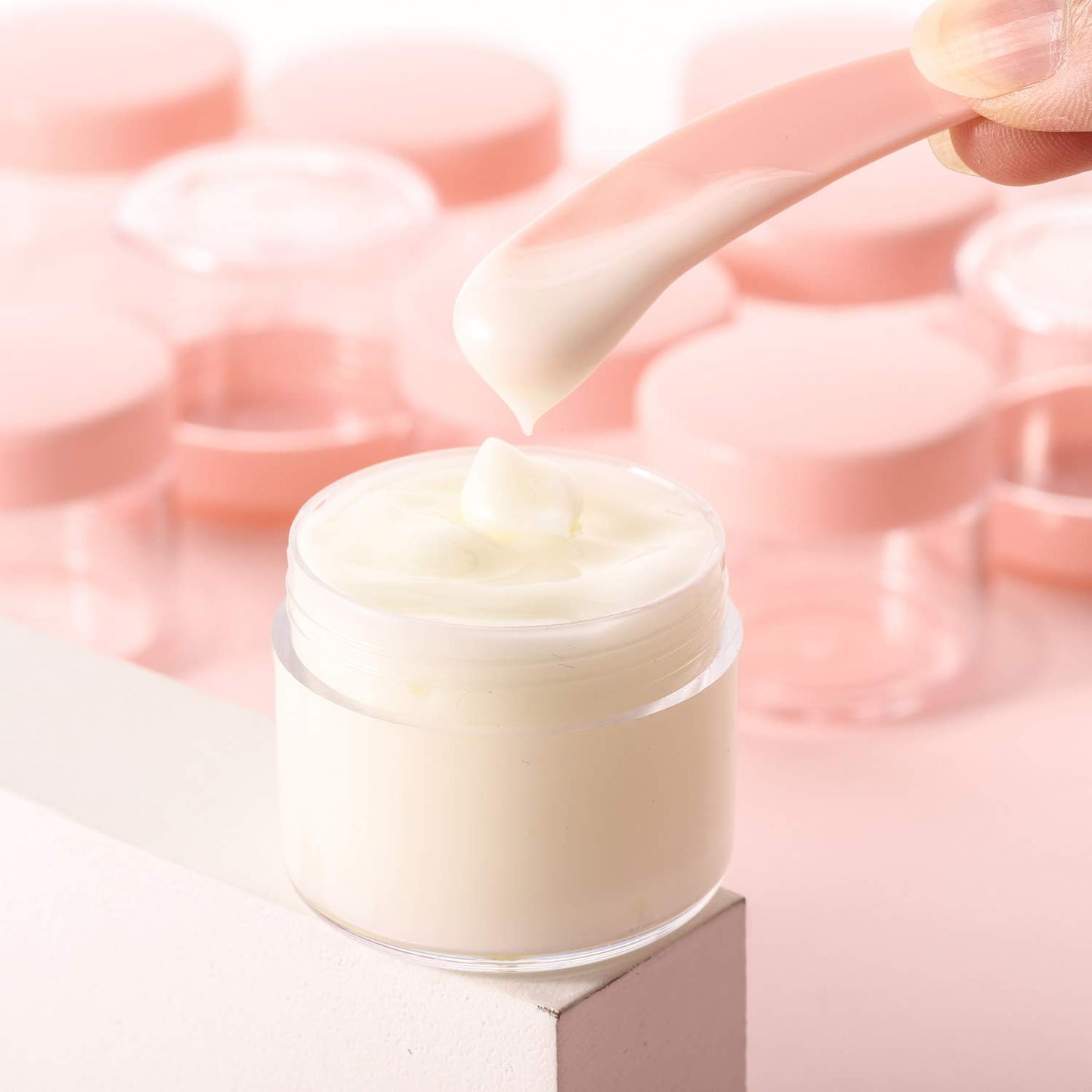 Refillable Cosmetic Sample Jars - 100 Pack 20g (0.7oz) Pink Small Travel Containers with Lids + 10 Mini Makeup Spatulas - BPA Free